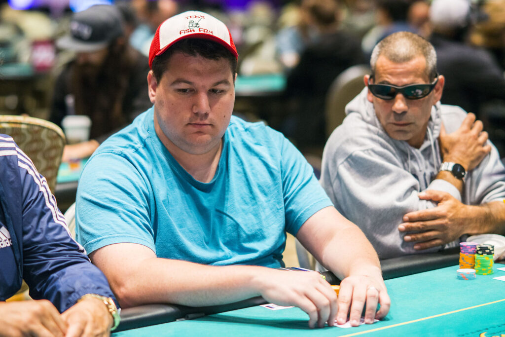 Six-time World Series of Poker winner, professional poker player, and 2018 WSOP Player of the Year Shaun Deeb playing in a poker tournament.